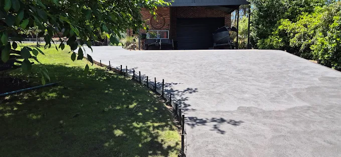Large concrete driveway freshly poured